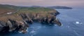 Aerial view with Mizen Head Lighthouse with spectaculars cliffs in West Cork Ireland Royalty Free Stock Photo