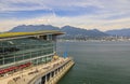 Aerial view of modern architecture at Burrard Landing, Convention Center and harbor with mountains in Vancouver, Canada Royalty Free Stock Photo