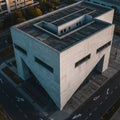 Aerial view of a modern, geometrically designed building with a distinctive angular Royalty Free Stock Photo