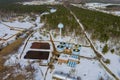 Aerial view of modern little industrial sewage treatment plant at work in winter season Royalty Free Stock Photo