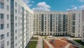 Aerial view of a modern residential buildings and an empty children playground. Video. Newly built white house on summer Royalty Free Stock Photo