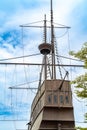 a very tall building with a mast and a cross on it Royalty Free Stock Photo