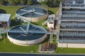 Aerial view of modern water cleaning facility at urban wastewater treatment plant. Purification process of removing