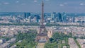 Aerial view from Montparnasse tower with Eiffel tower and La Defense district on background timelapse in Paris, France. Royalty Free Stock Photo