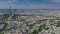 Aerial view from Montparnasse tower with Eiffel tower and La Defense district on background timelapse in Paris, France. Royalty Free Stock Photo