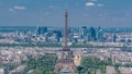 Aerial view from Montparnasse tower with Eiffel tower and La Defense district on background timelapse in Paris, France. Royalty Free Stock Photo