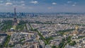 Aerial view from Montparnasse tower with Eiffel tower and La Defense district on background timelapse in Paris, France. Royalty Free Stock Photo