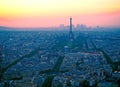 Aerial view, from Montparnasse tower at sunset, view of the Eiffel Tower and La Defense district in Paris, France.