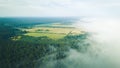 Misty sunrise over countryside path Aerial view Latvia Royalty Free Stock Photo