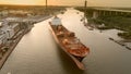 Aerial view of a mostly empty container ship leaving the port of Savannah, Georgia, USA Royalty Free Stock Photo