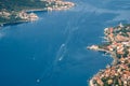 Aerial view of motor boats in the sky blue sea of the Bay of Kotor Royalty Free Stock Photo