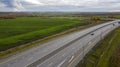 Aerial view of motorway intersections, of speeding cars and trucks