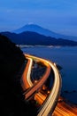 Aerial view of Mountain Fuji with express way, roads at night in Royalty Free Stock Photo