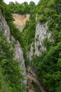 Mountain gravel road through canyon