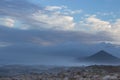 Aerial view of mountain in the morning. Mountains in fog and clouds with stones and rocks foreground. Royalty Free Stock Photo