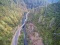 Aerial view of Mountain road with forested hills Royalty Free Stock Photo