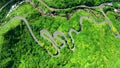 Aerial view mountain road at Jinguashi, Taiwan. Car driving through the curve.