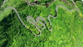 Aerial view mountain road at Jinguashi, Taiwan. Car driving through the curve.