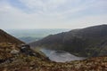 aerial view from a mountain to a lake coming from a glacier. Comeragh Mountains, Waterford, Ireland