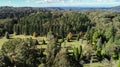 Aerial view of mountain tree garden including eucalypts and conifers