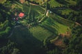 Aerial view of a mountain village with green scenery