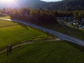 Aerial view. Mountains and camping, road, summer day sunset. motorcycle tourists. Travel and tourism. green hills. Bohinjska