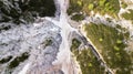 Aerial view of the mudflow with snow high in the Alpine mountains, Top view Royalty Free Stock Photo