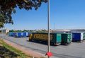 Aerial view of Multiple cargo trucks parked in large wide parking on a sunny