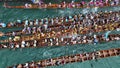 Aerial view of multiple university teams rowing boats in the Aberdeen Boat Race