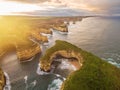 Aerial view of Mutton Bird Island arches at sunrise Royalty Free Stock Photo