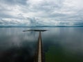 Aerial view of Mutton Island and causeway in Galway,IE under a bright sky