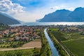 Aerial view on Nago Torbole city and Sarca River. Royalty Free Stock Photo