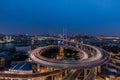 Aerial view of Nanpu Bridge at dusk, landscape of the modern Shanghai city skyline. Beautiful night view of the busy bridge across Royalty Free Stock Photo