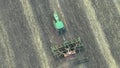 Aerial view of natural green wheat field. Green wheat stalks. Drone flying over Beautiful Natural Wheat field. Nature