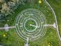 Aerial view of a natural labyrinth in the garden. Photo from the drone