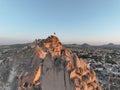 Aerial view of natural rock formations in the sunset, valley with cave houses in Cappadocia, Turkey. Natural landscape Royalty Free Stock Photo