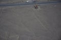Aerial view of Nazca tower for observation of lizard, tree and frog figures, made with lines in the desert. Nazca Peru