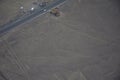 Aerial view of Nazca tower for observation of lizard, tree and frog figures, made with lines in the desert. Nazca Peru