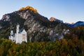 Aerial view of Neuschwanstein castle before sunset. Autumn in Germany Royalty Free Stock Photo