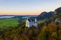 Aerial view of Neuschwanstein castle before sunset. Autumn in Germany Royalty Free Stock Photo