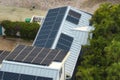 Aerial view of new american home roof with blue solar photovoltaic panels for producing clean ecological electric energy Royalty Free Stock Photo