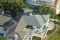 Aerial view of new american home roof with blue solar photovoltaic panels for producing clean ecological electric energy Royalty Free Stock Photo