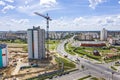 Aerial view of new apartment building under construction with crane on blue sky background Royalty Free Stock Photo