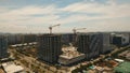 Building under construction with cranes in the city. Philippines, Manila, Makati. Royalty Free Stock Photo