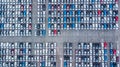 Aerial view new cars lined up in the port for import and export, Top view of new cars lined up outside an automobile factory for Royalty Free Stock Photo