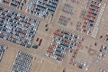 Aerial view of new cars at parking port in automobile factory. Royalty Free Stock Photo