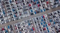 Aerial view new cars parking for sale stock lot row, New cars dealer inventory import export business commercial global, Royalty Free Stock Photo