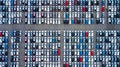 Aerial view new cars parking for sale stock lot row, New cars dealer inventory import export business commercial global, Royalty Free Stock Photo