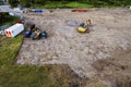 Aerial view on a new construction site . Ground work with excavator. Starting new project. Building industry. Commercial or