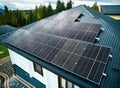 Aerial view of new modern house cottage with solar photovoltaic panel system on roof. Royalty Free Stock Photo